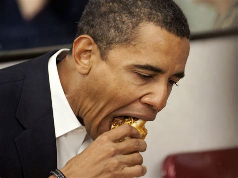 Barack Obama: Lighting up and chowing down on hot dogs - the President