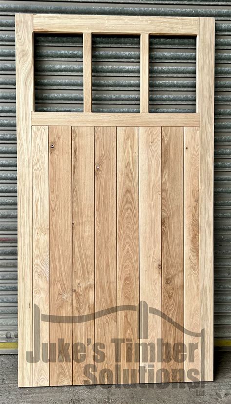Bespoke Traditional Oak Side Garage Doors | Juke's Timber Solutions