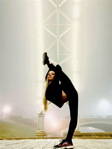 Contortionist Jordan Mcknight Relaxing In A Triple Fold Jordan