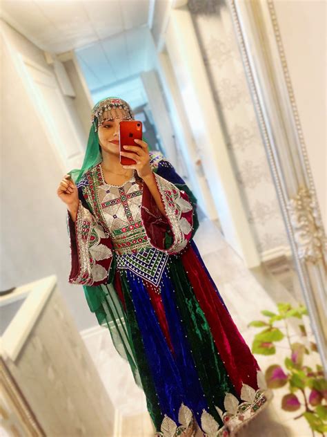 'This is how we dress': Afghan women overseas pose in colorful attire