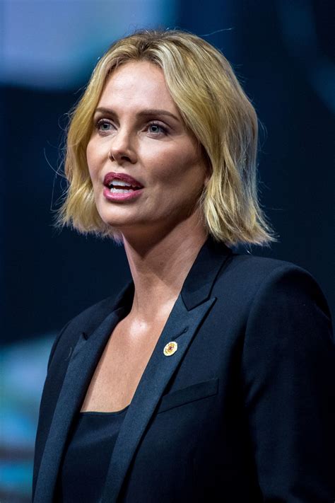Charlize Theron Latest Photos - CelebMafia