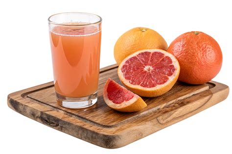 refreshing glass  pink grapefruit juice   rustic board