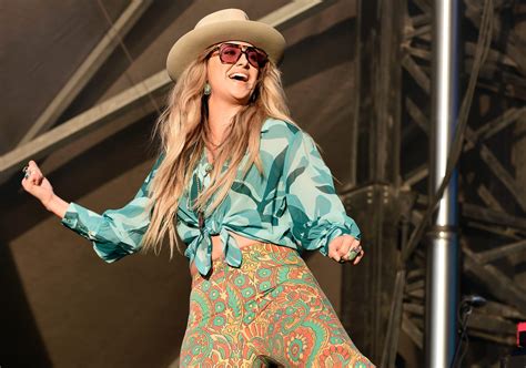 See Lainey Wilson Stun on Stage in a Crop Top and Bell Bottoms
