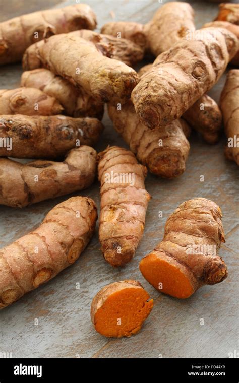 preparing fresh turmeric root Stock Photo - Alamy