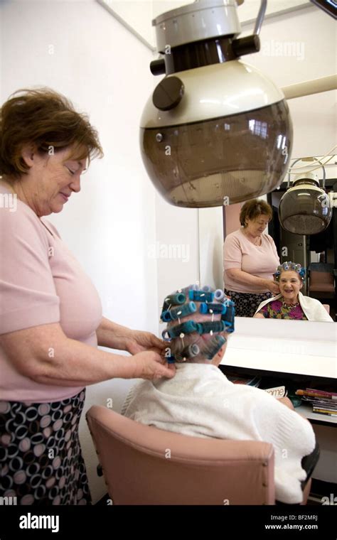 Stylist and Client at The Old Hair Salon Stock Photo - Alamy