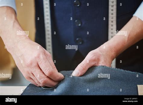 Experienced Tailor Stitching Seams on Custom Garment Stock Photo - Alamy