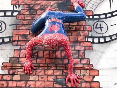 spider man brick wall   year  dressed   spider man