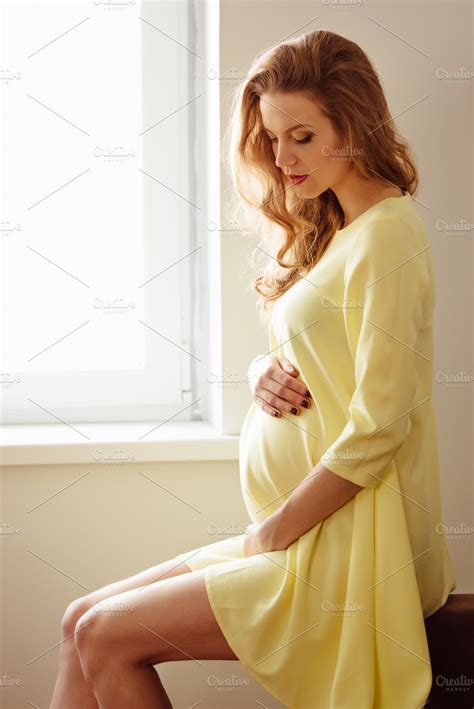 Beautiful pregnant girl featuring adult, alone, and attractive | People