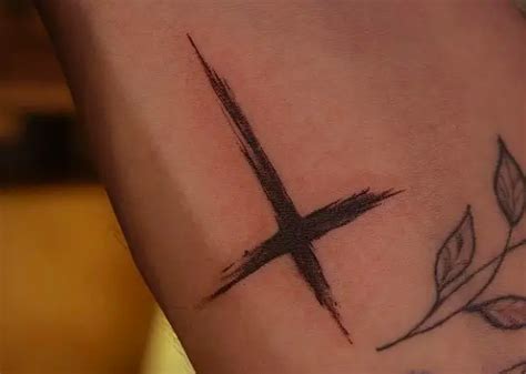 What Does An Upside-Down Cross Tattoo Mean?