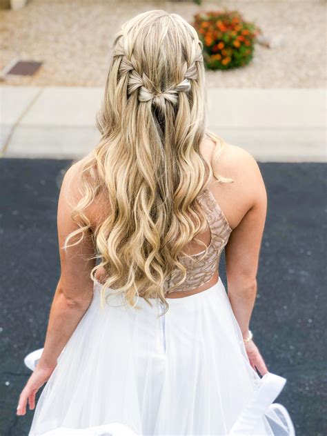 Waterfall braid styles dominate this year's wedding season