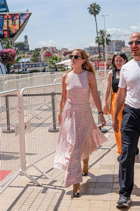 Emma Watson combines her summer dress with these unexpected shoes – and