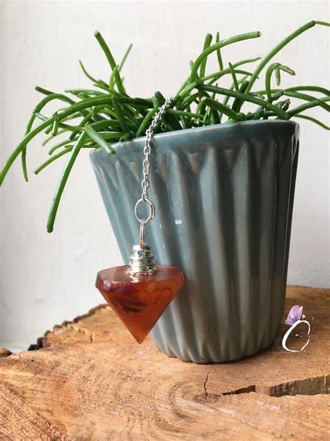 carnelian conical pendulum   crystallis