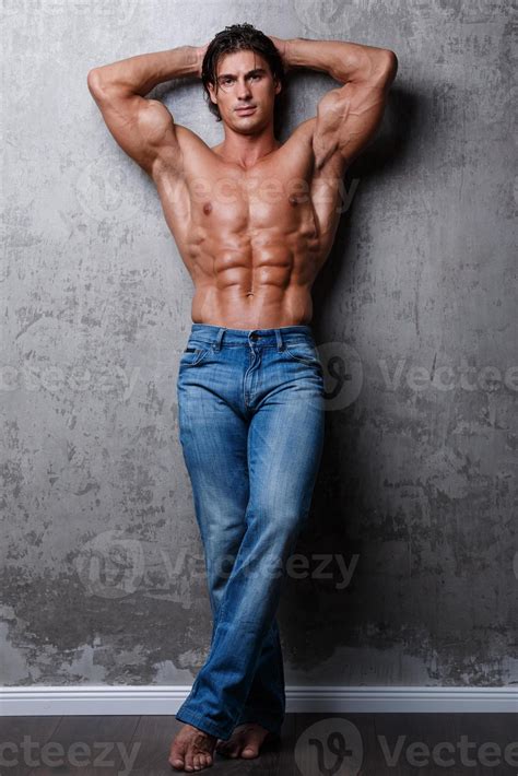 Portrait of Handsome muscle man wearing blue jeans 16114268 Stock Photo
