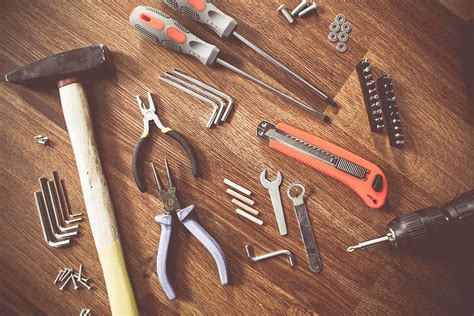 assorted handheld tools wooden parquet construct craft repair