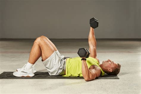 chest press dumbbells exercise royalty    stock