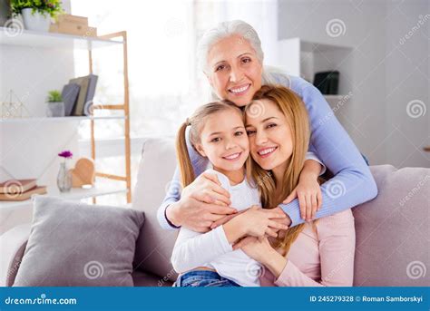 portrait   peaceful positive people cuddle sitting sofa toothy