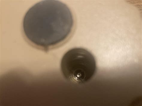 How to remove a Stripped Screw on an Old Console? I've tried the rubber