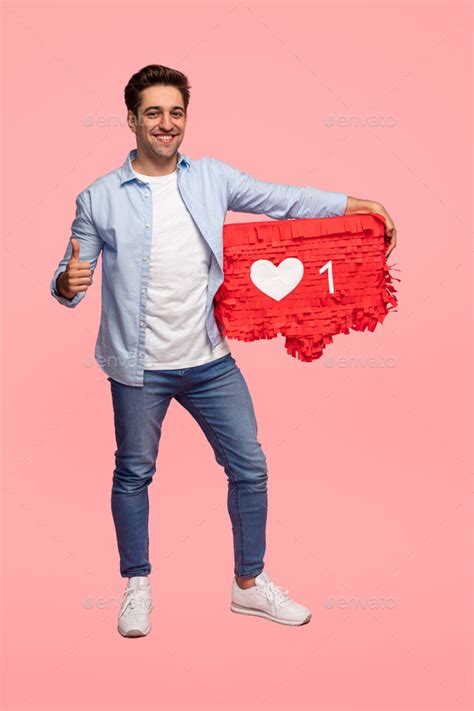 cheerful young man   sign stock photo  kegfire photodune