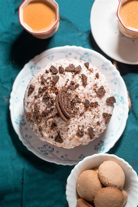 Red and White Round Cake on White Ceramic Plate · Free Stock Photo