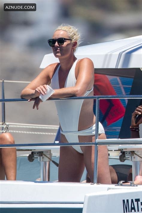 Lindsey Vonn in a while one-piece while vacationing with her fiance P.K