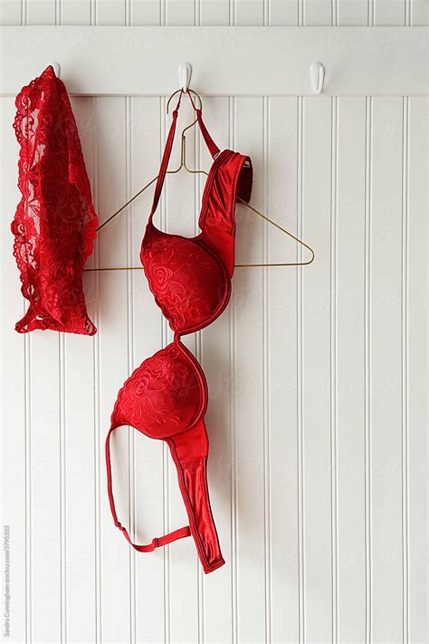 "Red Lace Bras And Panties Hanging On Hooks" by Stocksy Contributor ...