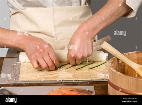 Cook preparing makis Stock Photo - Alamy