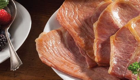how long to cook ham slices in oven