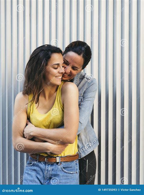 Pretty Girl Couple Hugging Each Other and Smiling, Affection, Love and
