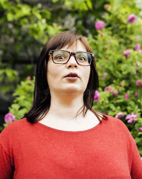 Pretty Modern Mature Fat Woman Outside Wearing Glasses, Emotional
