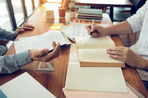 premium photo colleagues  paperwork  office