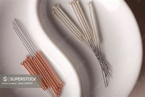 acupuncture needles - SuperStock