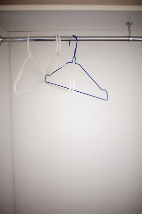 Free Image of Empty wire coat hangers in a closet | Freebie.Photography