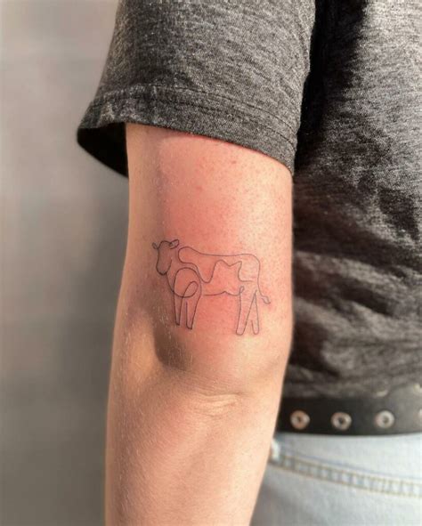 12+ Minimalist Cow Tattoo Ideas To Inspire You!