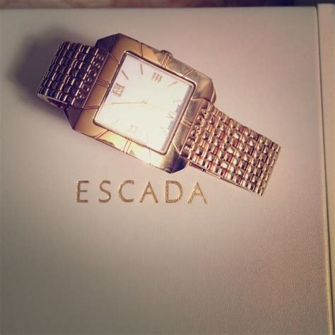 preowned authentic escada   box  cards