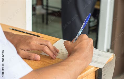 asian school students  uniform  examination  writing answer