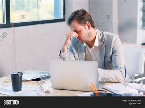 frustrated man office image photo  trial bigstock