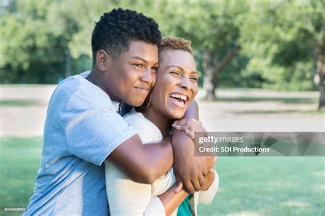 loving teenage son   mom  hug high res stock photo getty images
