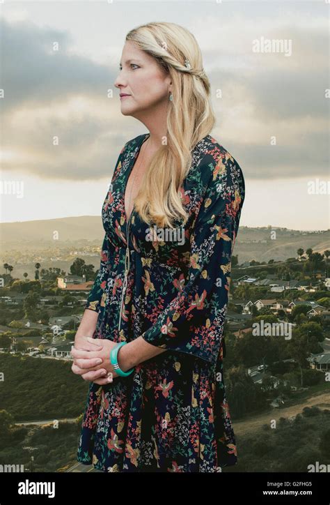 Blonde woman serious 40s hi-res stock photography and images - Alamy
