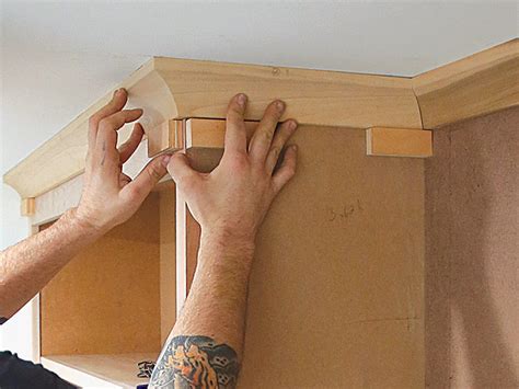 how to put up crown molding on kitchen cabinets
