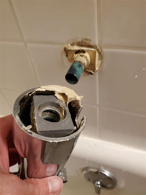 Replacing tub spout, is this just a lot of putty or something else? : r