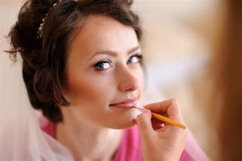 Premium Photo | Makeup for bride on the wedding day