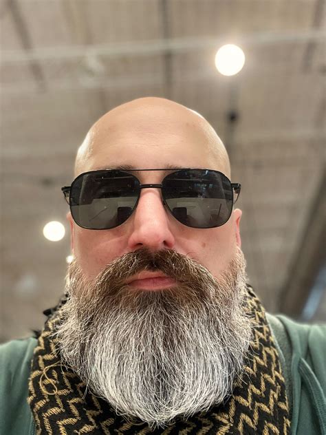 Offices debate if a freshly cut bald head is professional 35