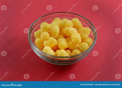 Puffed corn snack in bowl stock photo. Image of crunchy - 207595030