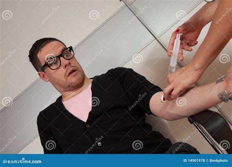 needle shot stock photo image  pretty needle brunette