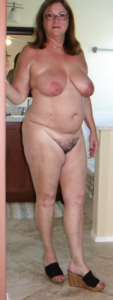 standing naked mature women