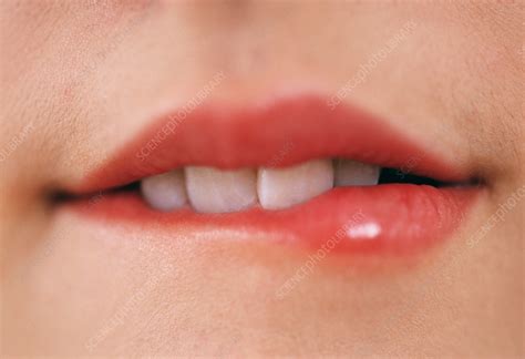 woman biting  lip stock image  science photo library