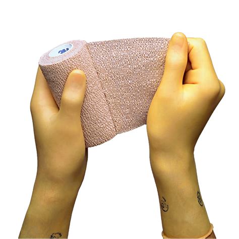 coban  adherent cohesive bandages tan     yard