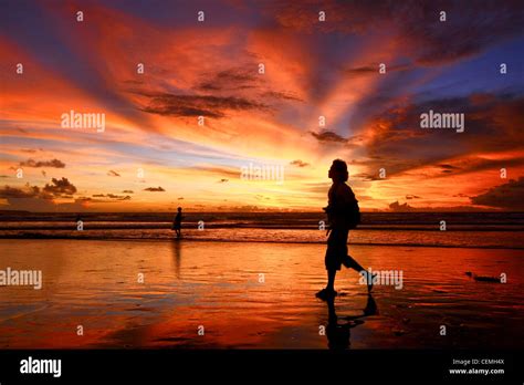 walking  sunset beach bali indonesia stock photo alamy