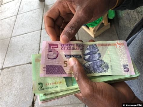 zimbabwe finance minister reviving economy  herculean task