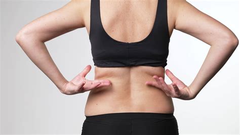 Woman checks the flabby skin. Body control 19974964 Stock Video at Vecteezy